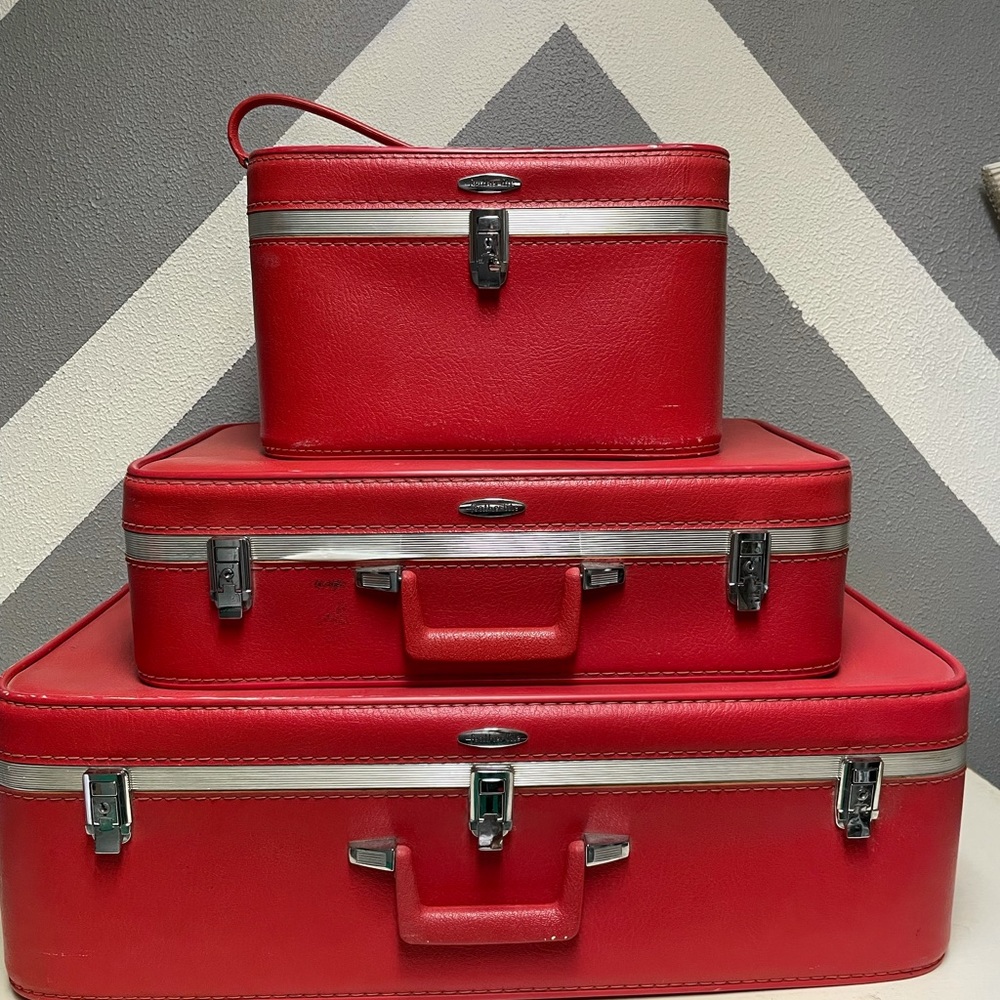 Red Vintage Featherlite suitcases